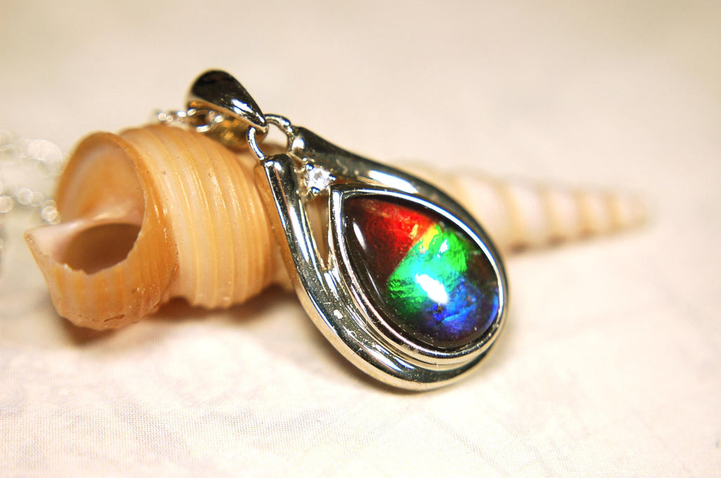 Ammolite pendant.Petite,feminine but very powerful.Rainbow color gem with sapphire.Birthday or Anniversary Gift for wife? 030416