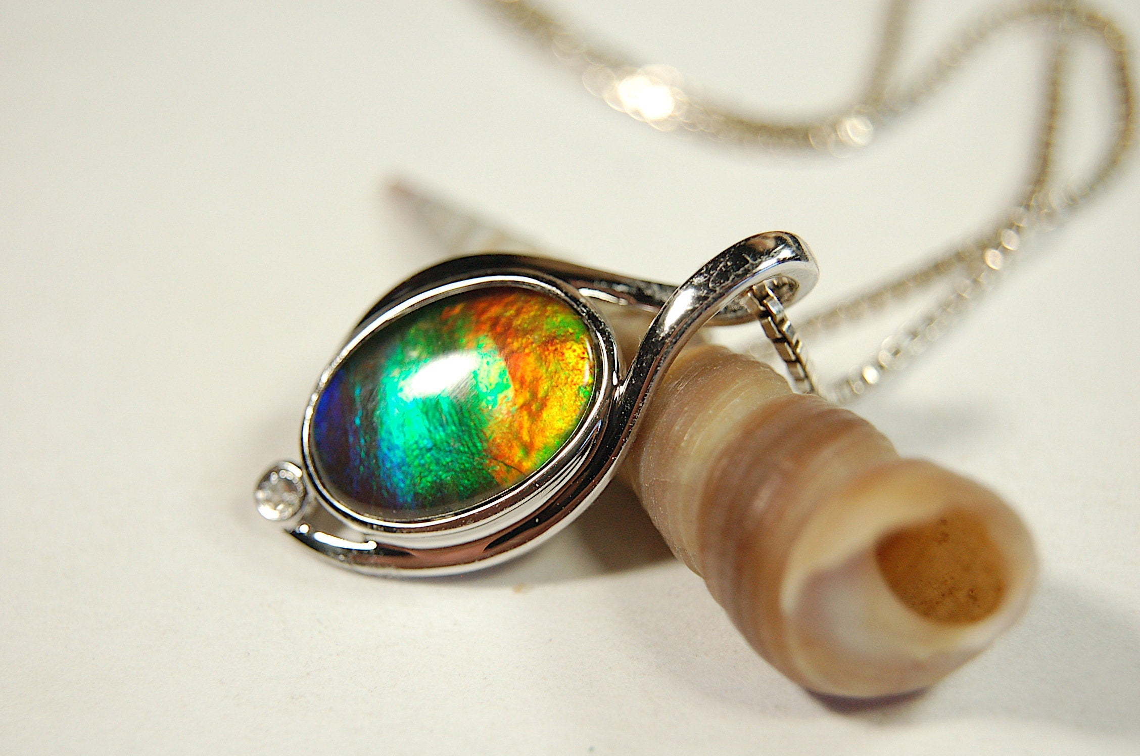 Ammolite Jewelry Pendant.Strong colors.Quality sterling Allergy free silver setting.Shipped free.071612