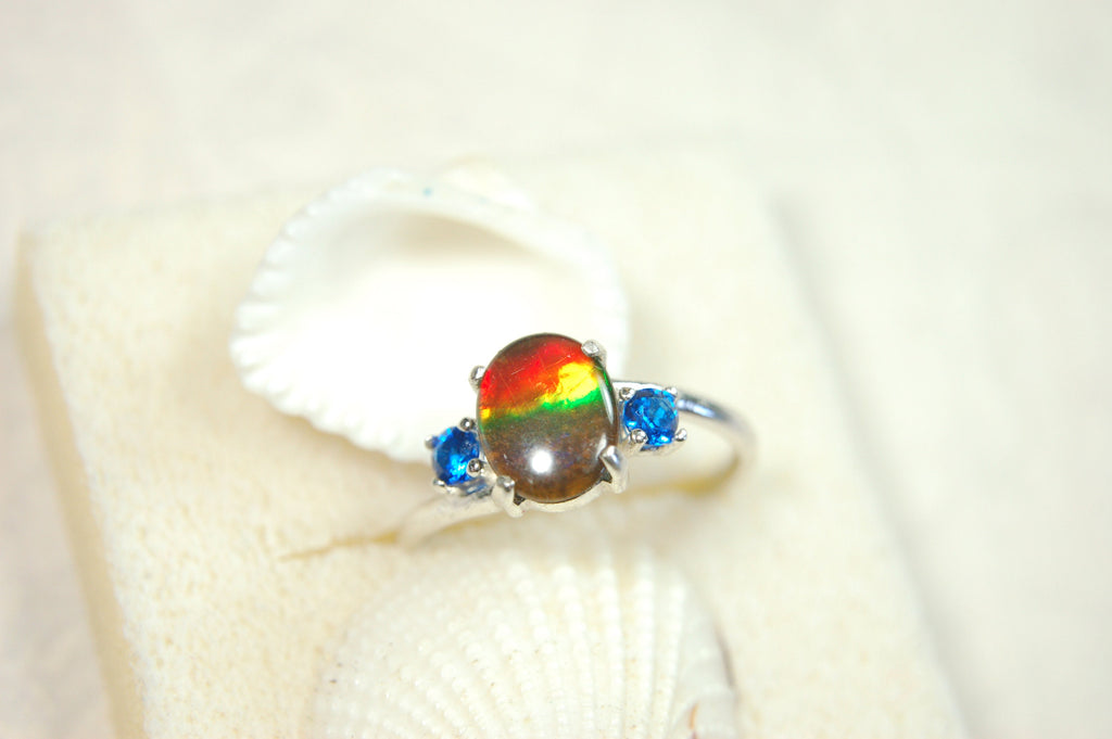 Ammolite Ring with brilliant Spinel side stones.Size 7.