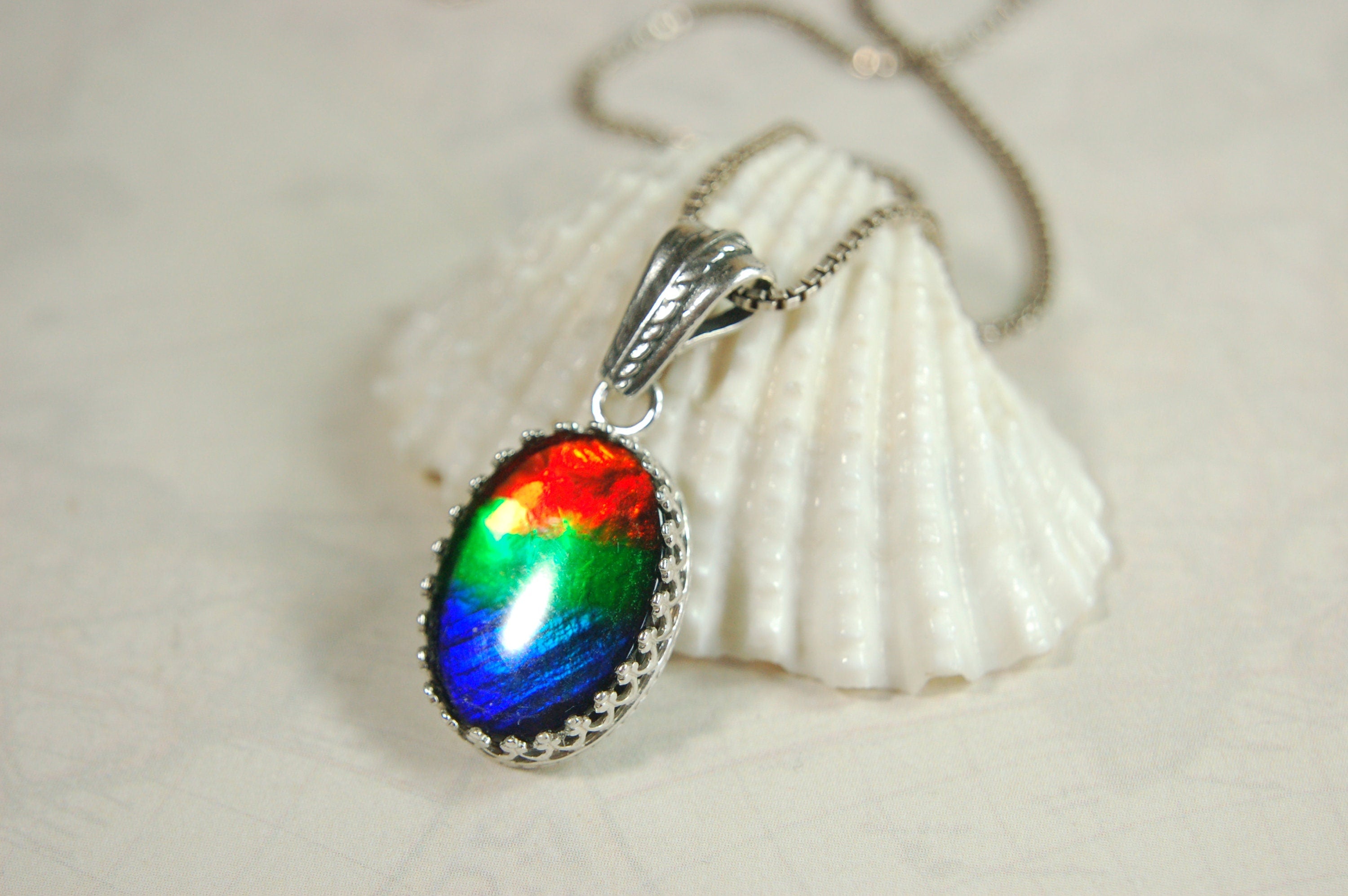 Colorful ammolite pendant - a one-of-a-kind addition to your collection or a perfect gift for someone special"021224
