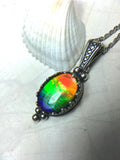 Genuine Ammolite Jewelry Pendant.Rainbow gem.Sterling Silver setting.No import taxes under CUSMA rules.062815