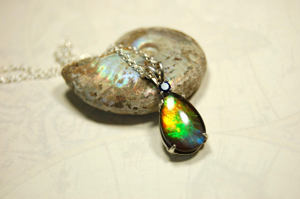 Sterling Silver set Ammolite Pendant with blue Sapphire.A gift idea for your wife she will treasure..060916