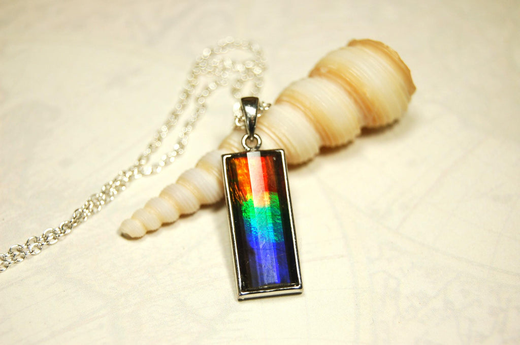 Unisex Jewelry.Ammolite Pendant.Bright Faceted rainbow gem.Price Reduced--see disclosure below in description