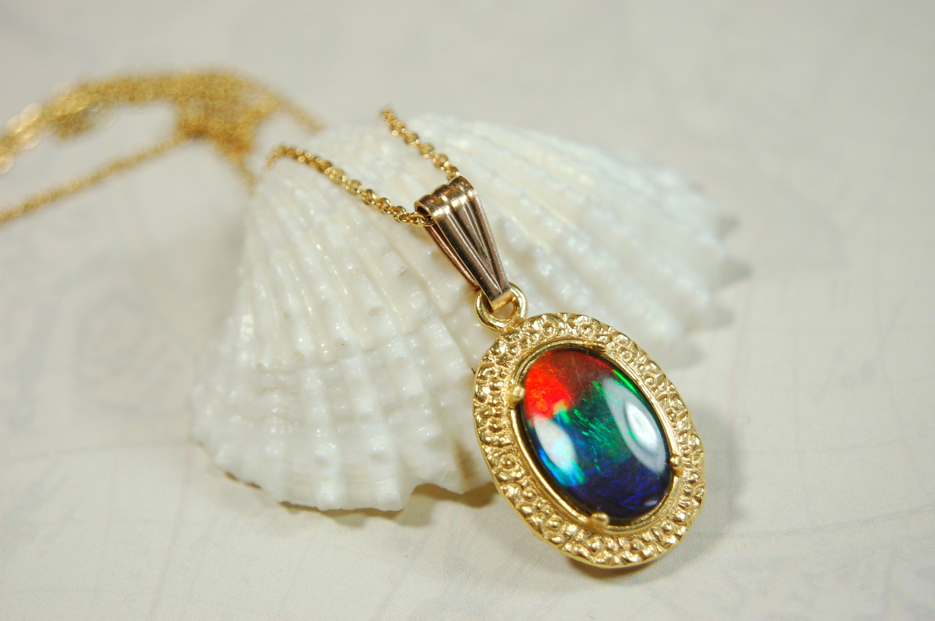Ammolite.Gorgeous Alberta Ammolite Pendant in 14k Gold filled.The perfect birthday/anniversary gift for her.010424