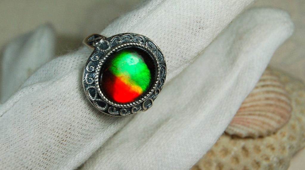 Ammolite Ring.Adjustable fit.Brilliant flashing colors.022219.