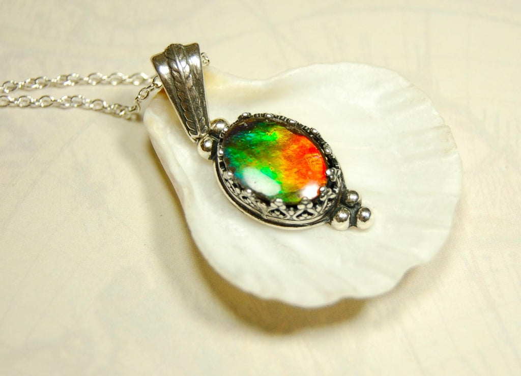 Ammolite pendant gift idea for wife..has four bright colors.041716