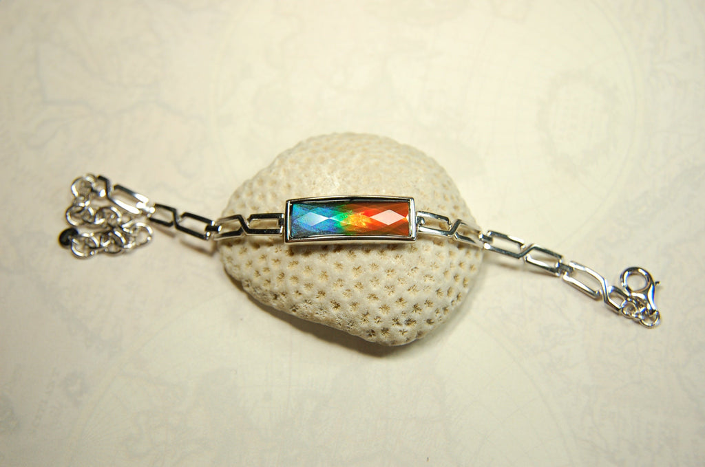 Ammolite Jewelry bracelet.Bright faceted gem shipped free.No import tax to US under CUSMA exemption #070614
