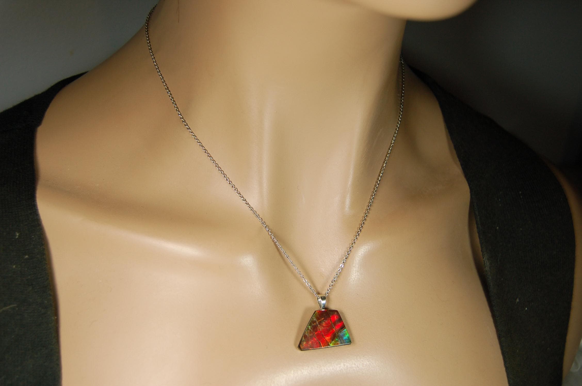Natural Ammolite pendant with natural cabochon gem mined in Alberta Canada.070915