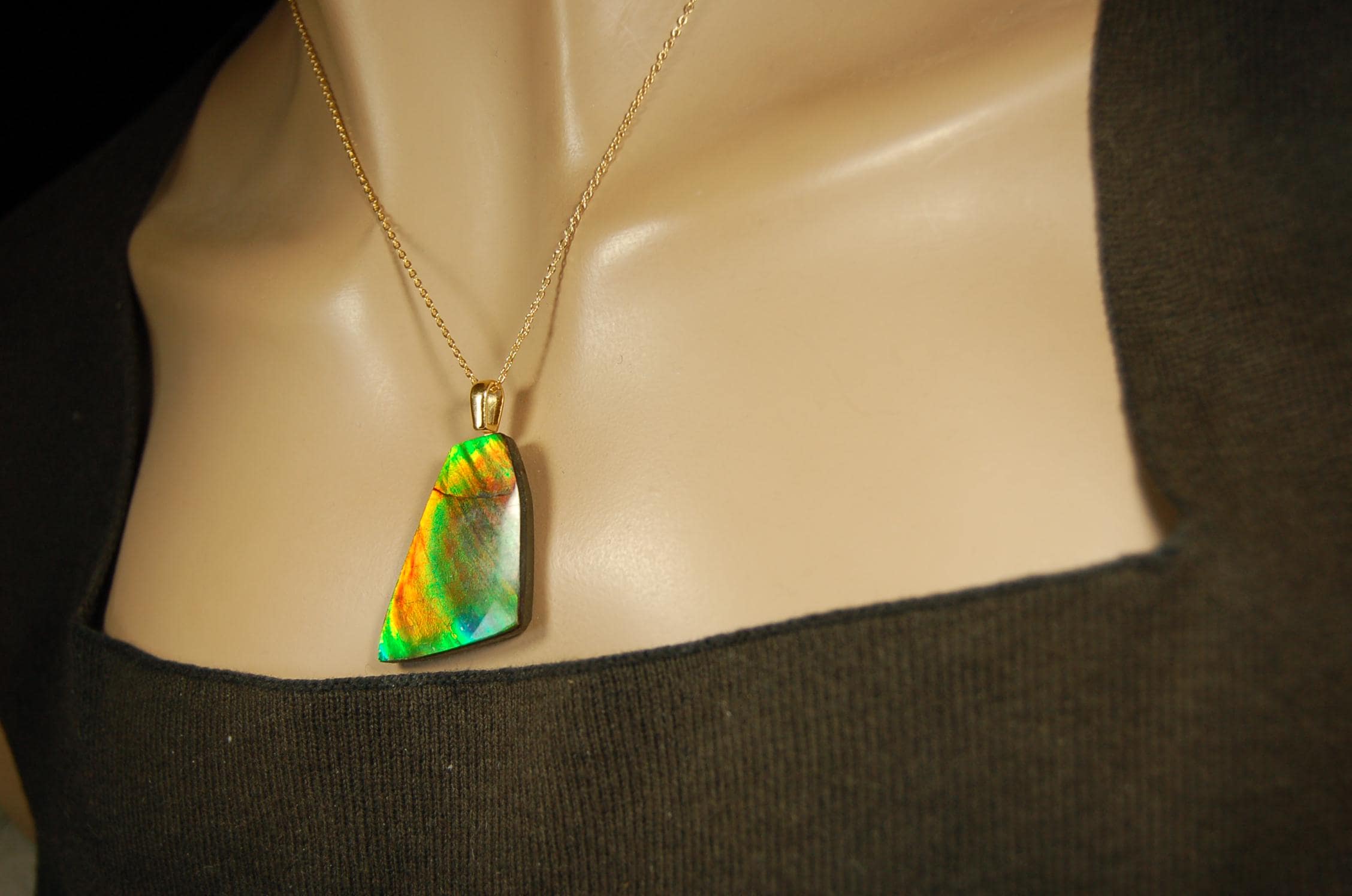 Ammolite Pendant.Natural Cabochon with strong color changing abilities.14kGF Gold bail.Elevate your style.030716