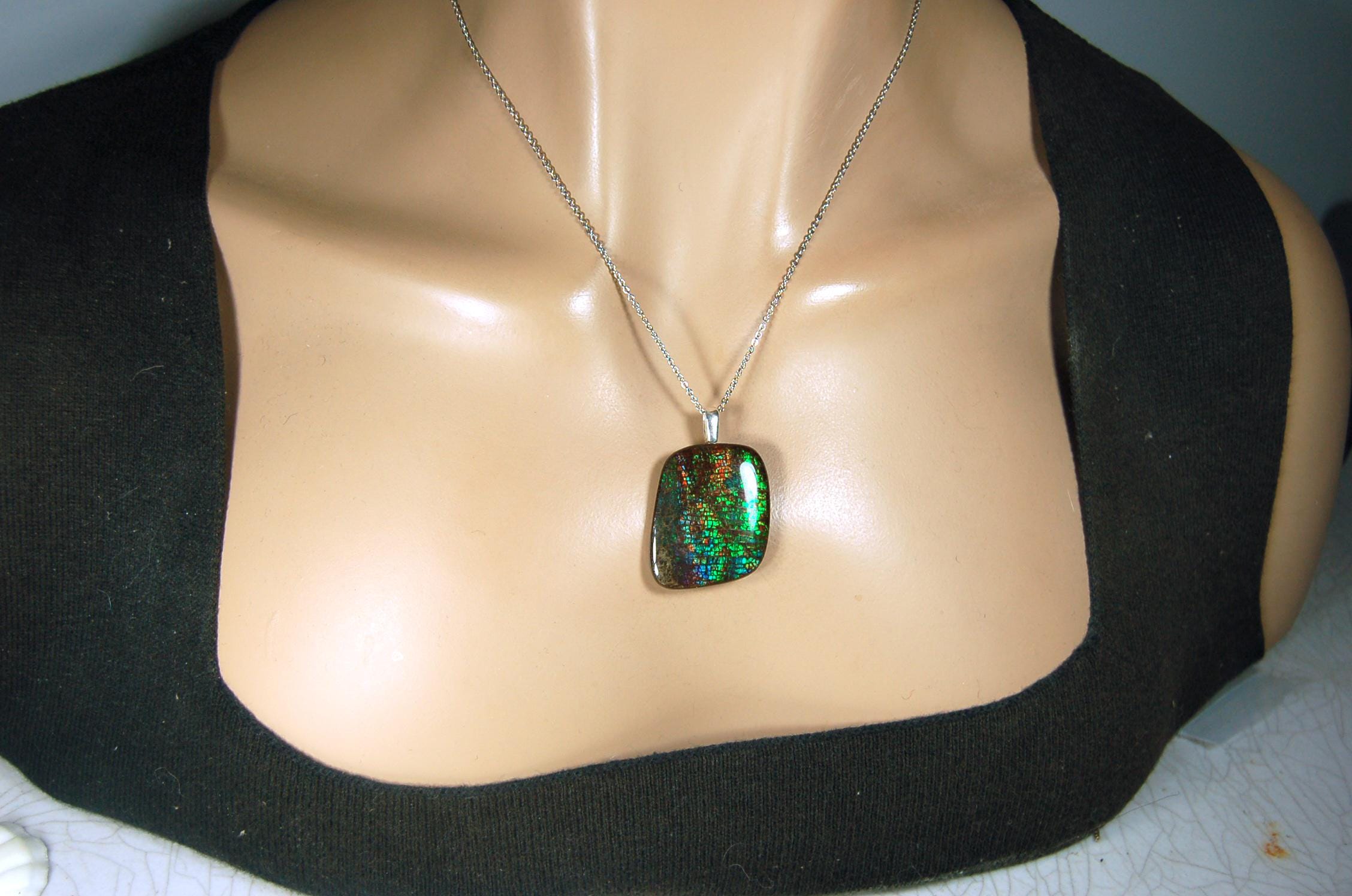 Ammolite Pendant Necklace.RARE Natural gem with brilliant sparks of color on black background.--071815