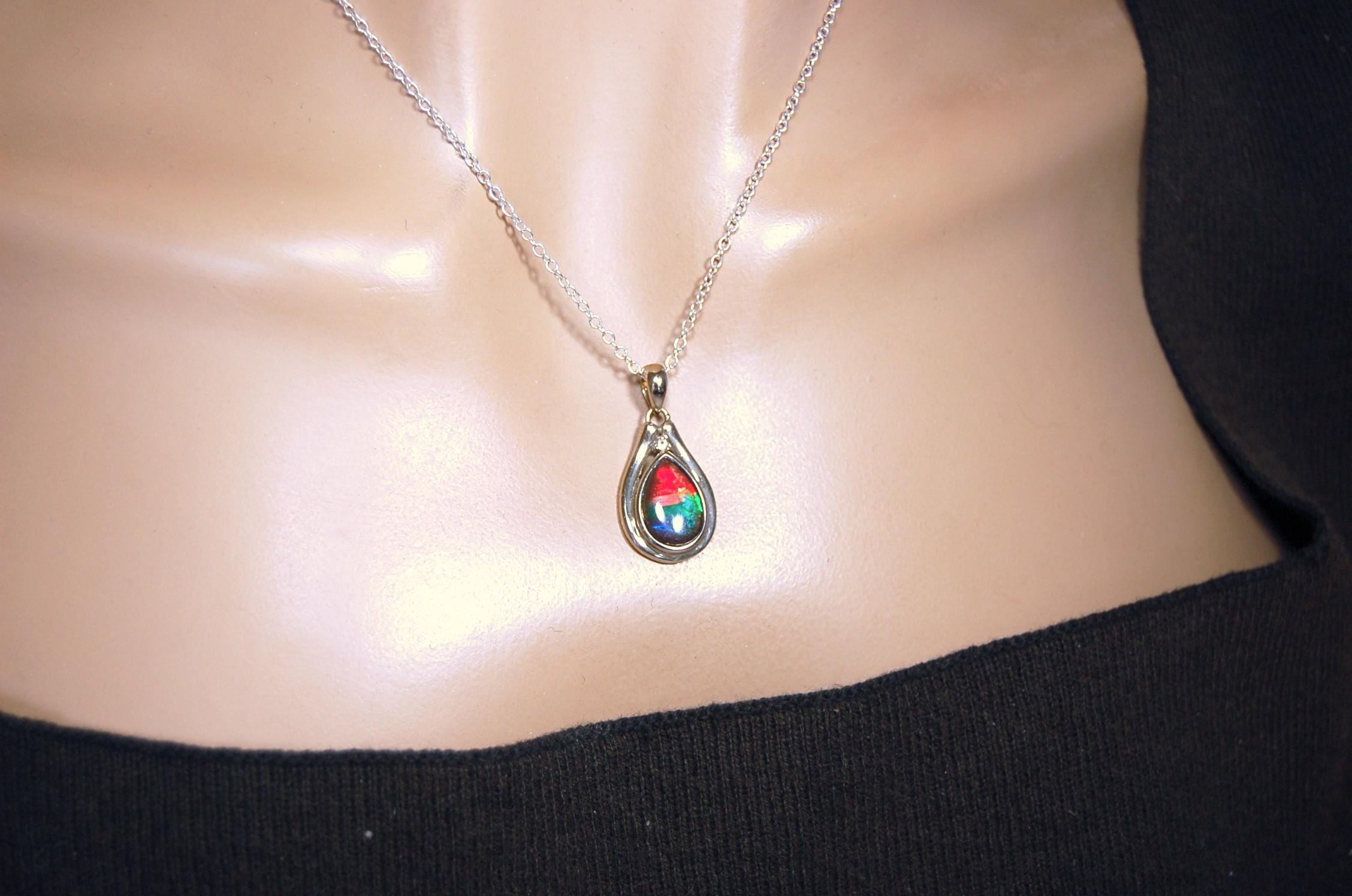 Ammolite pendant.Petite,feminine but very powerful.Rainbow color gem with sapphire.Birthday or Anniversary Gift for wife? 030416