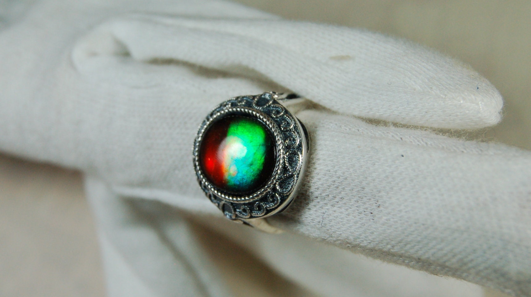 Ammolite Ring.Adjustable fit.Brilliant flashing colors.022219.
