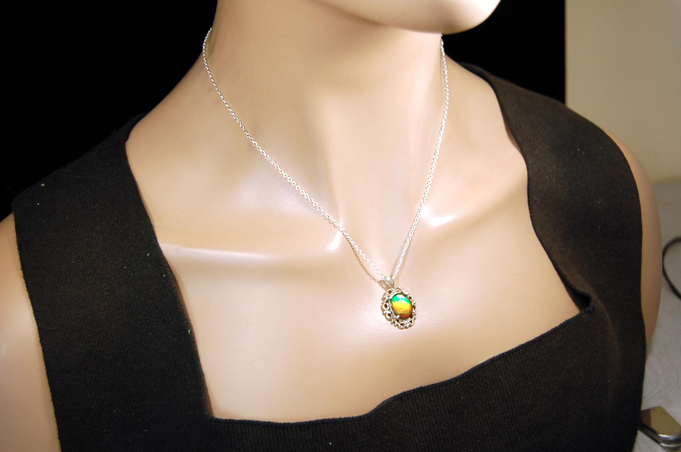 Ammolite pendant petite but powerful impact.Rich Sunset colors.Memorable gift.Fashion accessory.Rare jewelry.022216