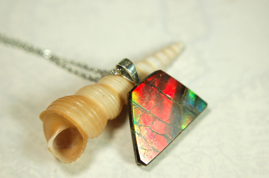 Natural Ammolite pendant with natural cabochon gem mined in Alberta Canada.070915