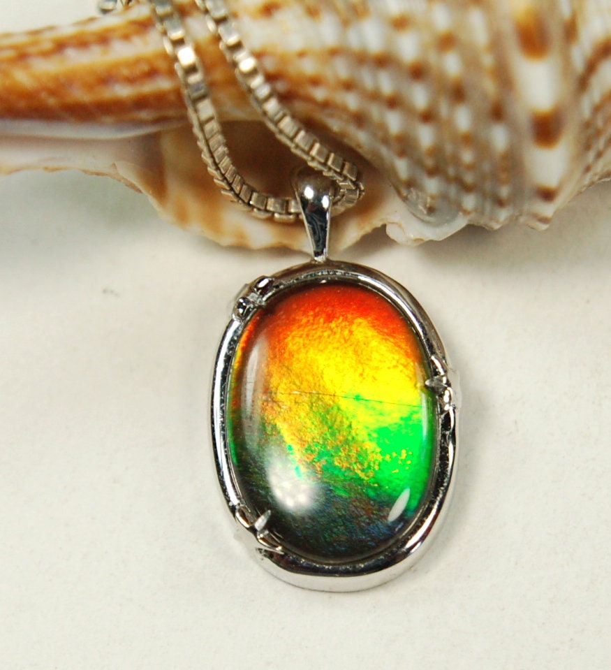 Ammolite Jewelry pendant with lovely rich colors that amaze.Canadian ammolite.Ammolite jewelry at its best.Ammolite from Canada.#051012