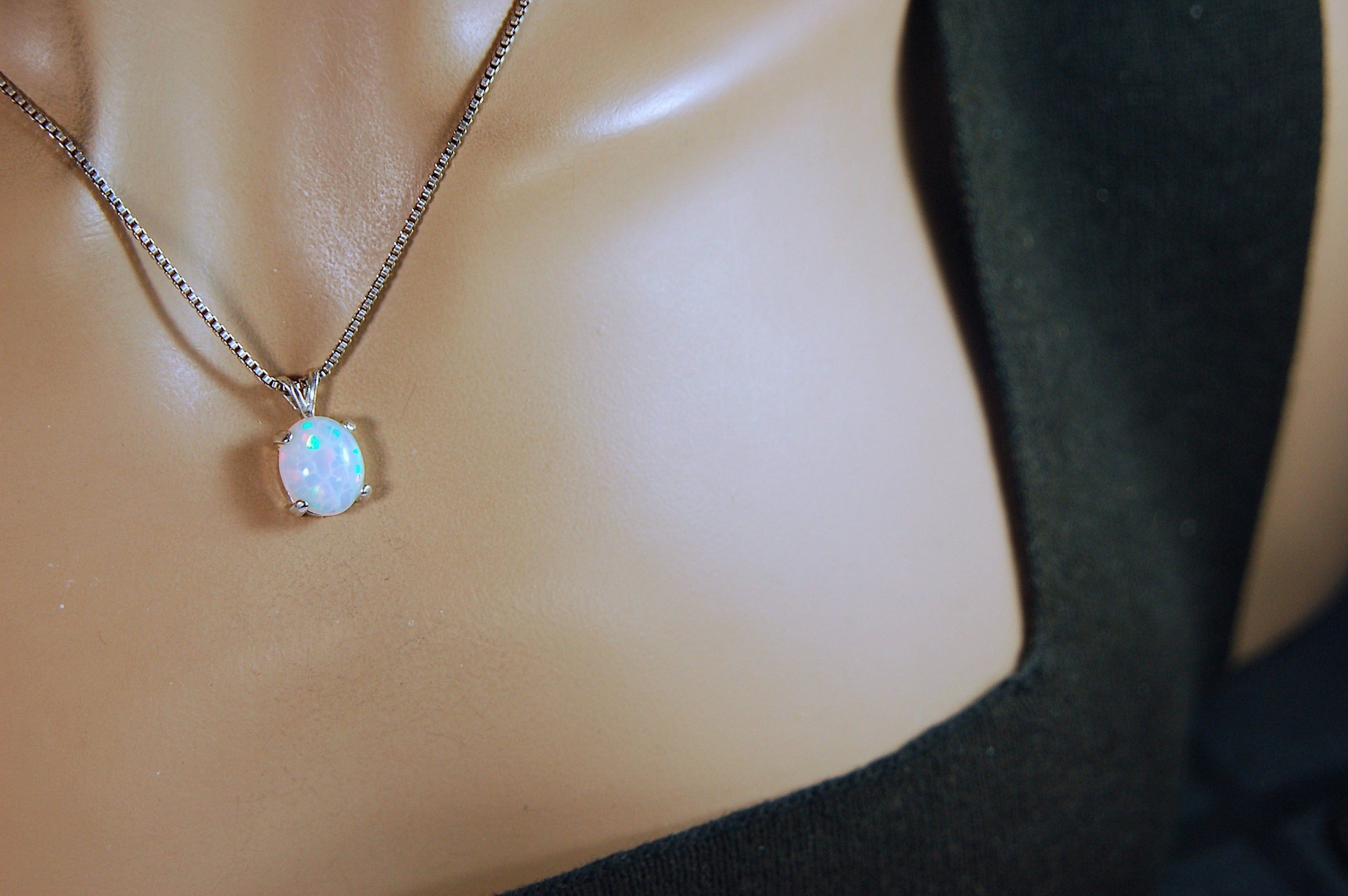 Opal pendant.Bright rolling colors. Desirable honeycomb gemstone.Perfect gift for her.MUST see colors in video.121213