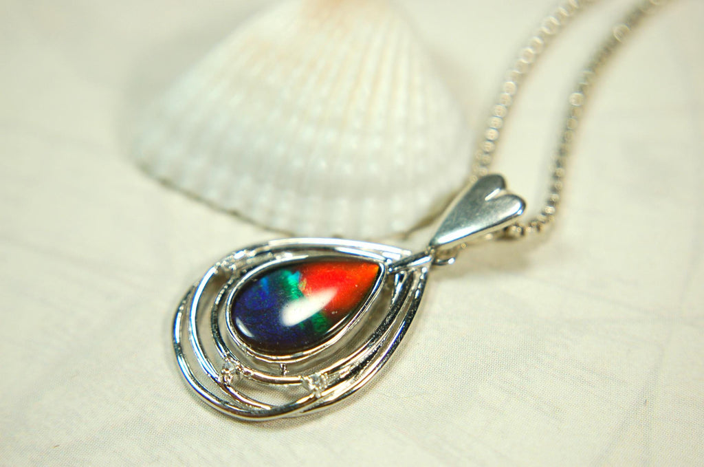 Eye-Catching Ammolite Pendant gift for Mothers Day she will treasure.Genuine Ammolite mined, finished and shipped from Canada 032015