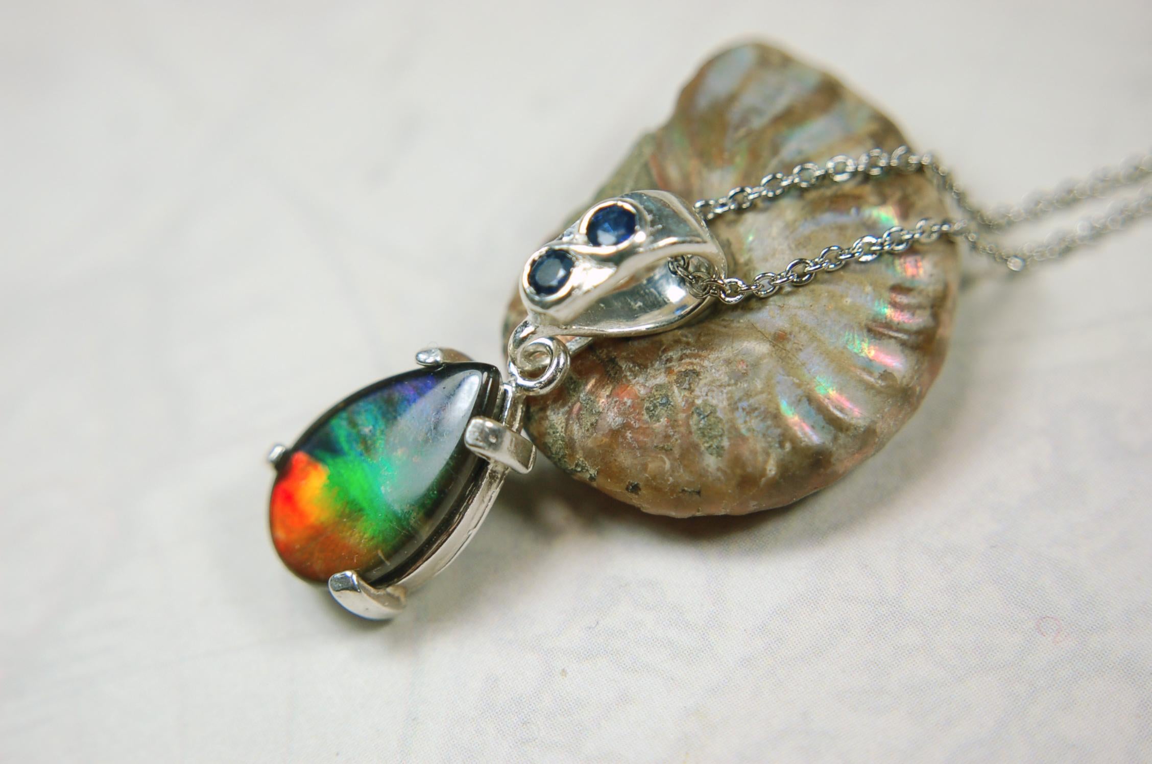 Ammolite Pendant Necklace.Sapphire studded bail.Brilliant rainbow colors.Sterling silver set.RARE gift for her.071115
