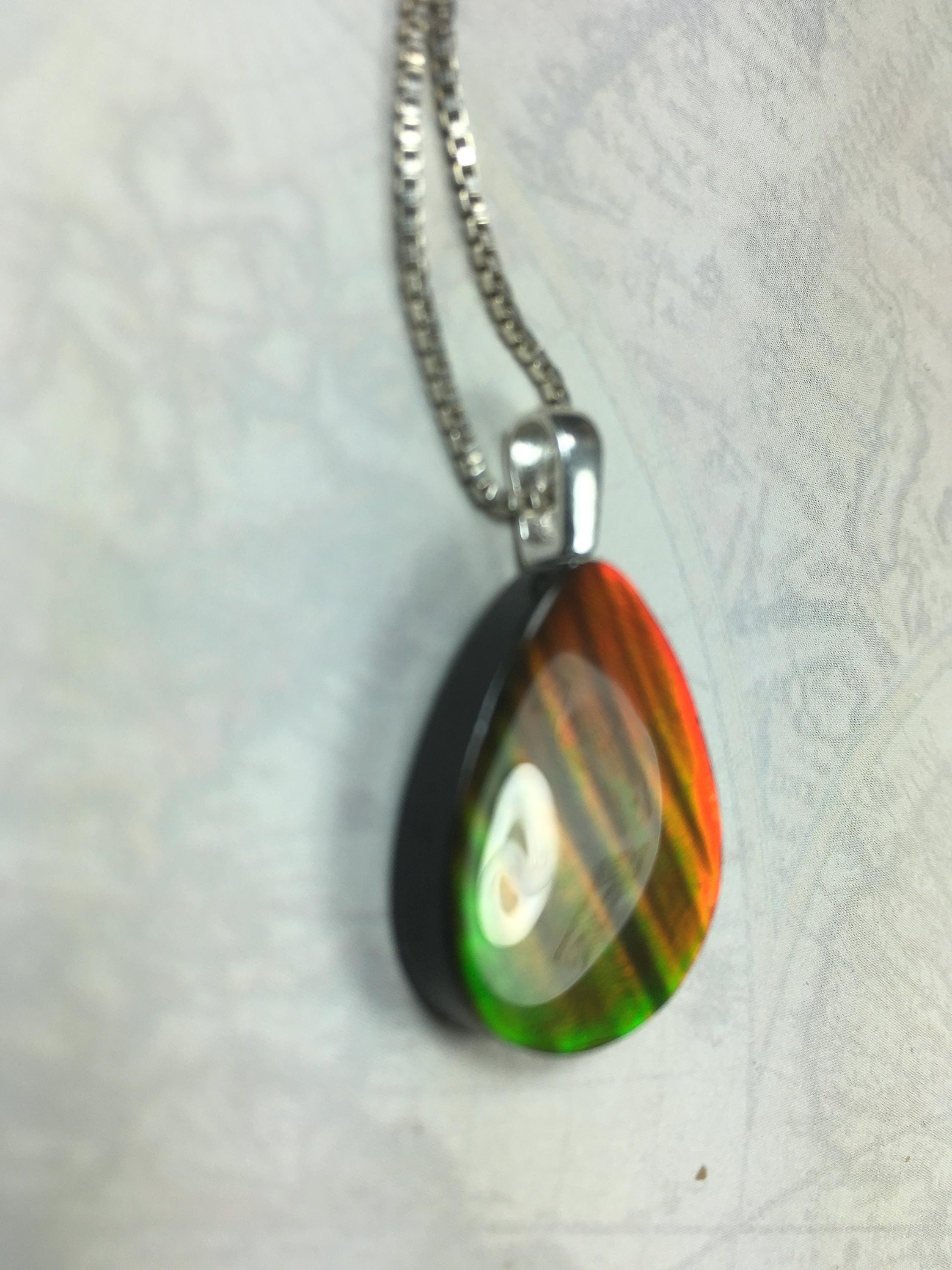 Red Ammolite Pendant with Tiger Stripes.Gift for wife.Brilliant color changing gem.All Natural Cabochon gem.062325
