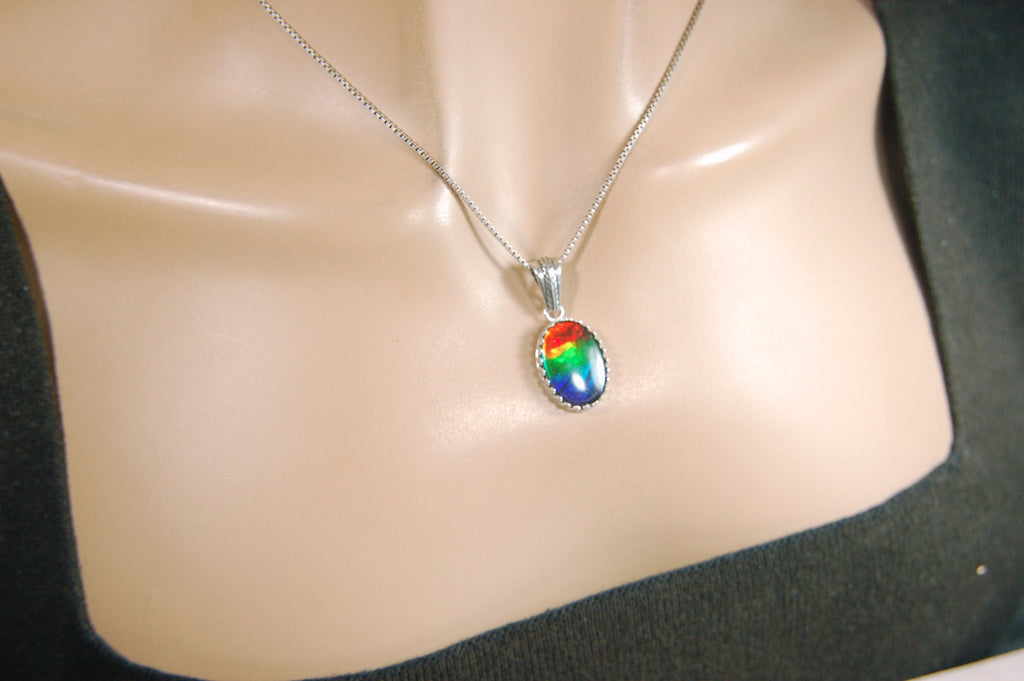 Colorful ammolite pendant - a one-of-a-kind addition to your collection or a perfect gift for someone special"021224