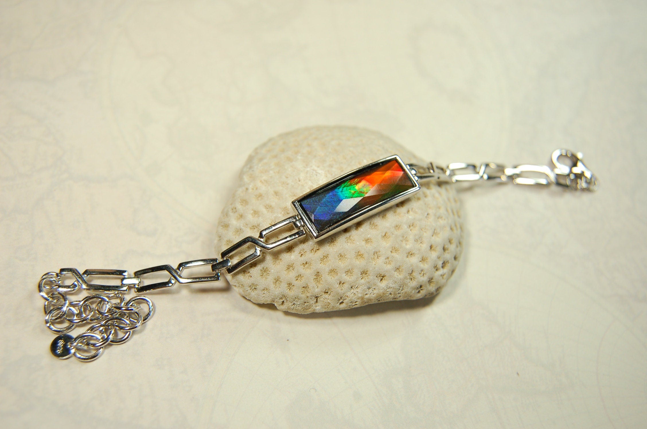 Ammolite Jewelry bracelet.Bright faceted gem shipped free.No import tax to US under CUSMA exemption #070614