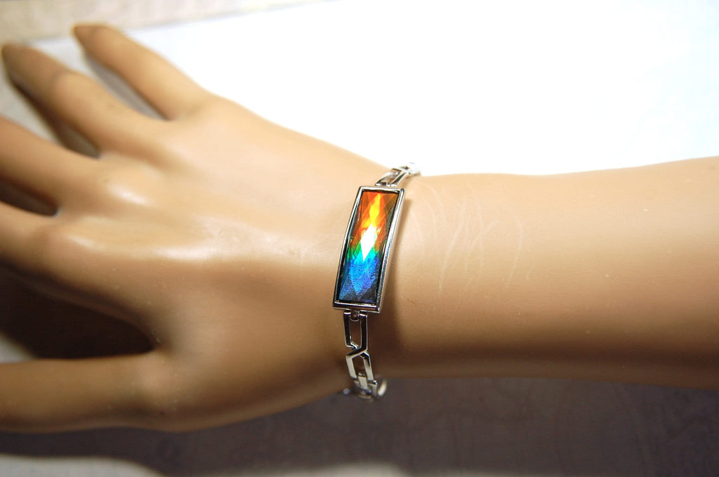 Ammolite Jewelry bracelet.Bright faceted gem shipped free.No import tax to US under CUSMA exemption #070614