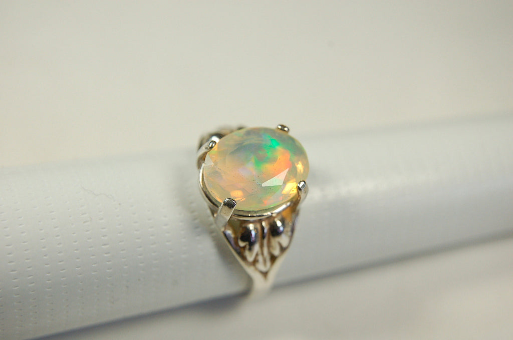 Opal ring.Bright Faceted Natural gem.Lovely flashing colors.#102612
