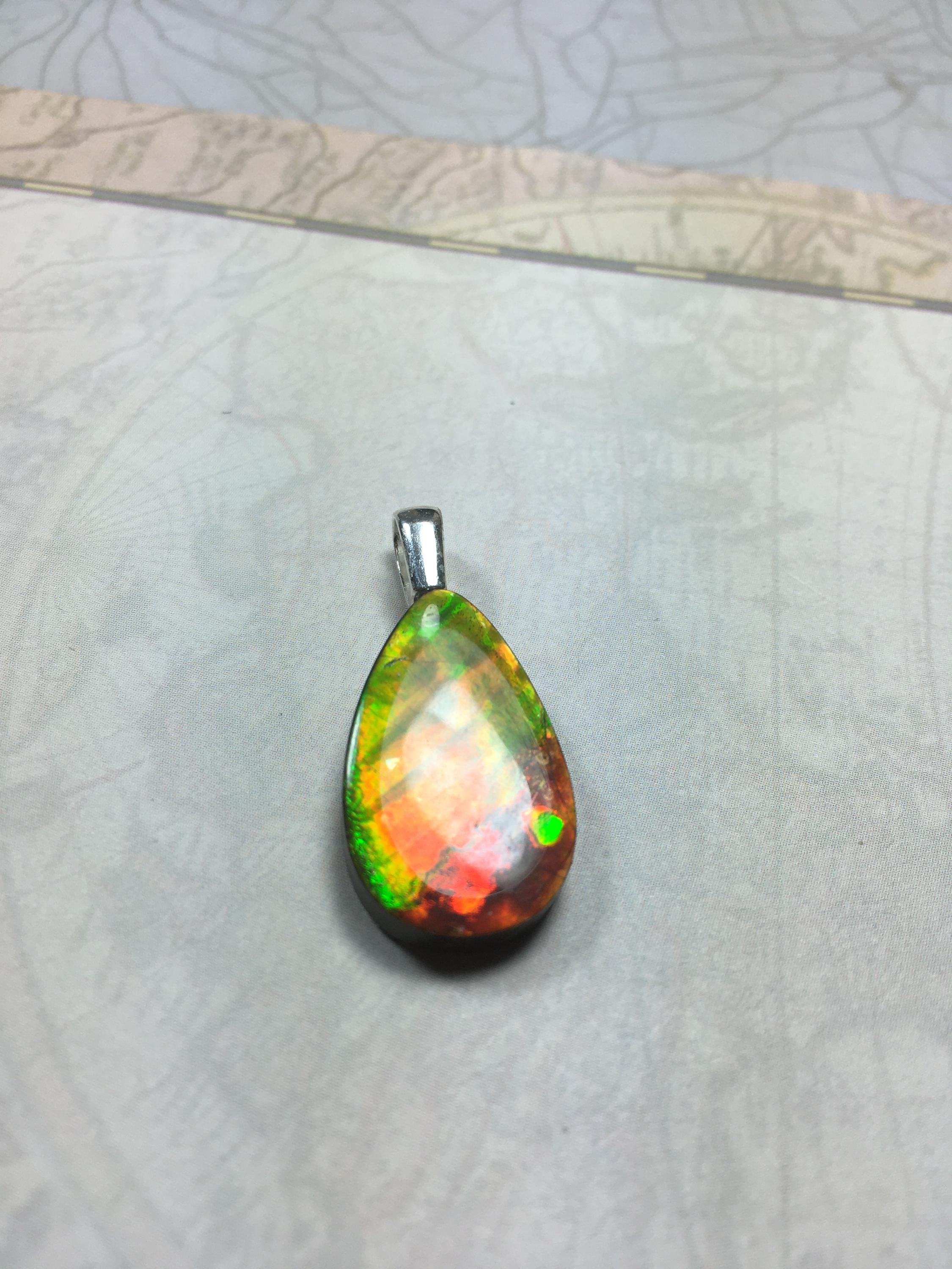 Anniversary gift idea.Unisex Jewelry.Ammolite Pendant Necklace, Sterling Silver Feather Bail. Color changing natural freeform cabochon.
