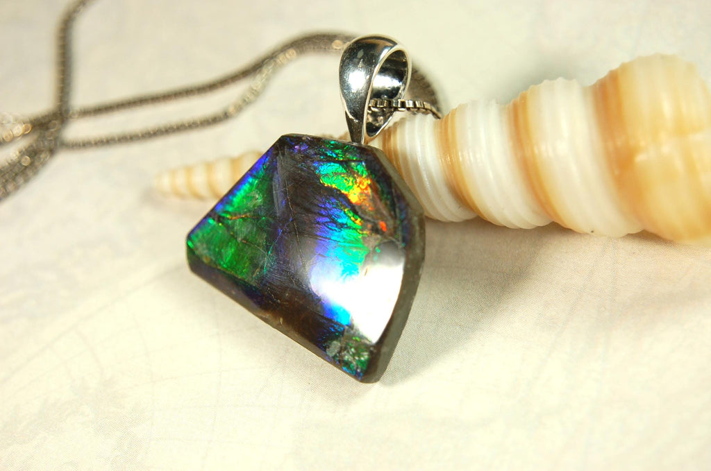Ammolite Jewelry Pendant Certified Canadian Gem.Ammolite Freeform Gem.Unisex and minimalist Style Jewelry.Gift idea?Must see video. 081714
