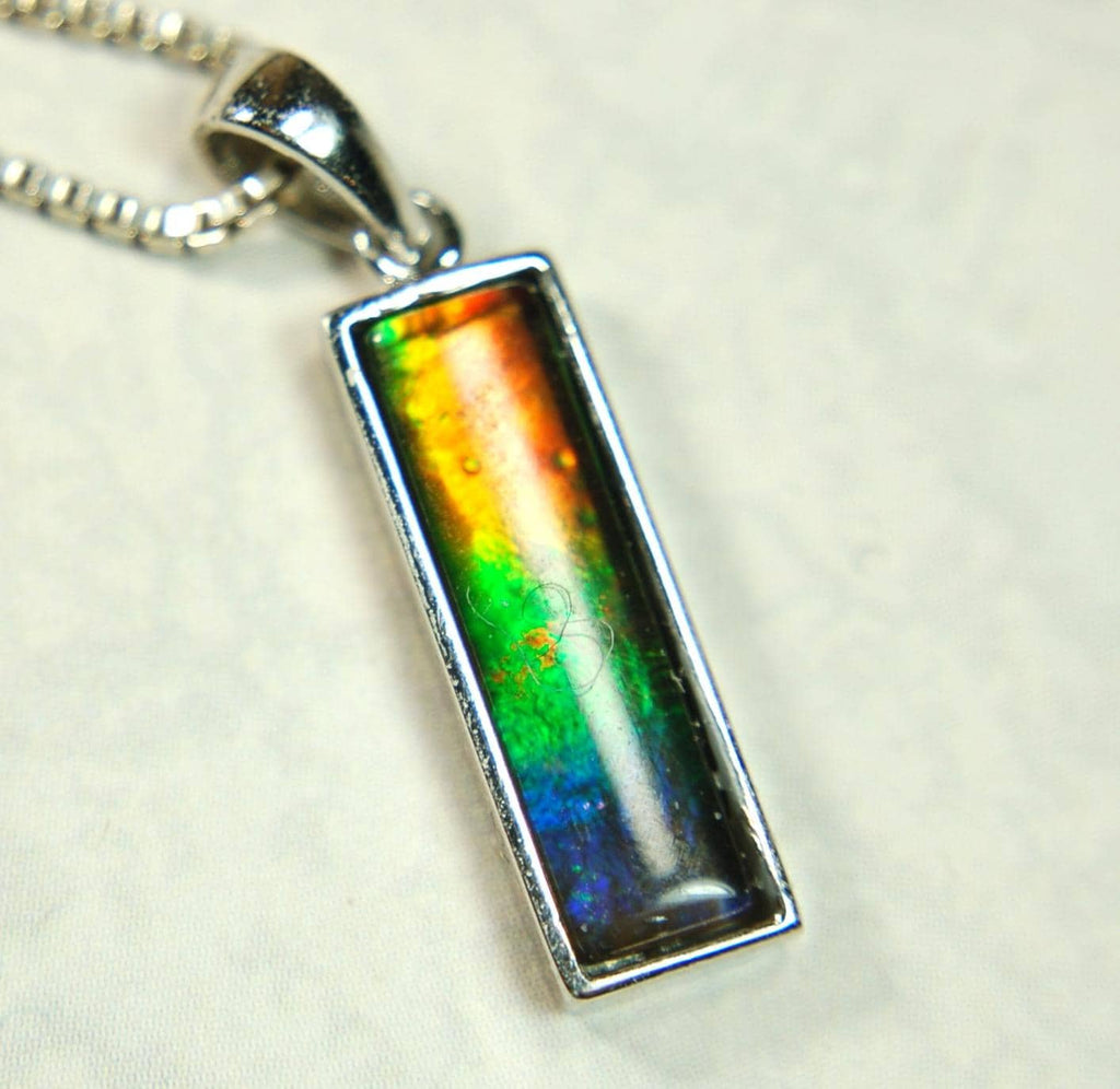 Lovely Ammolite pendant - the perfect gift for someone special.Sterling Silver plated with Rhodium so allergy free.052415