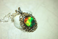 Ammolite Pendant from Alberta Canada.Genuine quality ammolite with warranty.The perfect gift.010926
