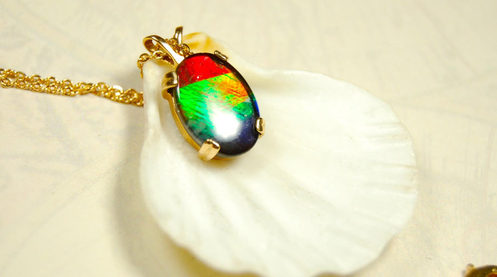Ammolite necklace pendant in solid 10k yellow gold.A gift your wife will treasure.Brilliant color changer. 071601