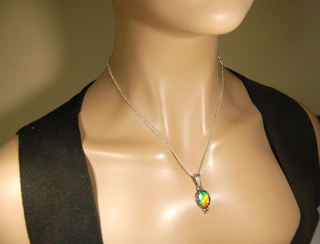 Ammolite pendant gift idea for wife..has four bright colors.041716