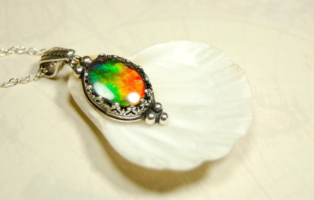 Ammolite pendant gift idea for wife..has four bright colors.041716