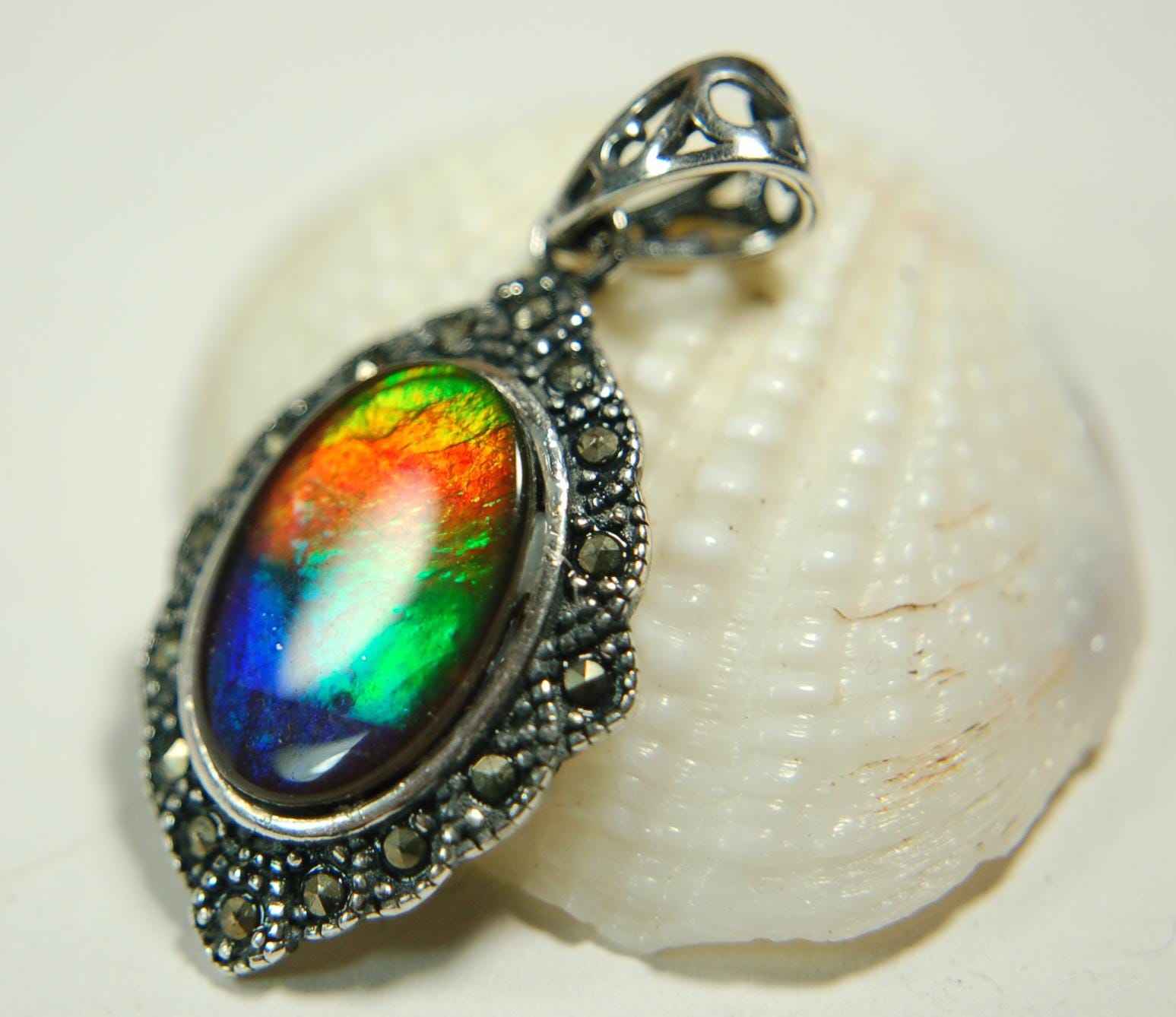 Ammolite jewelry pendant-a wifes birthgay gift Idea she will treasure.Genuine high quality ammolite mined and shipped from Canada.013115