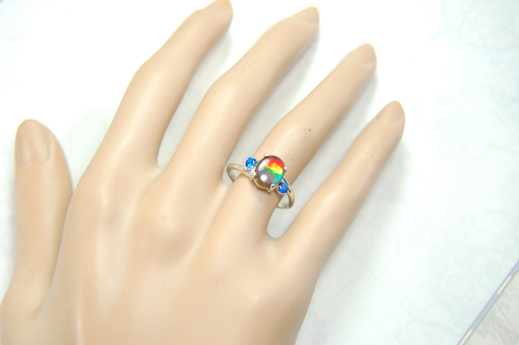 Ammolite Ring with brilliant Spinel side stones.Size 7.