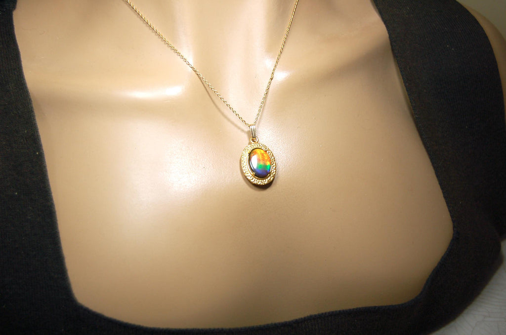 Ammolite pendant Anniversary gift idea for wife.Necklace set in 14kGF gold.Brilliant rainbow gem.Best seen in Video.033016