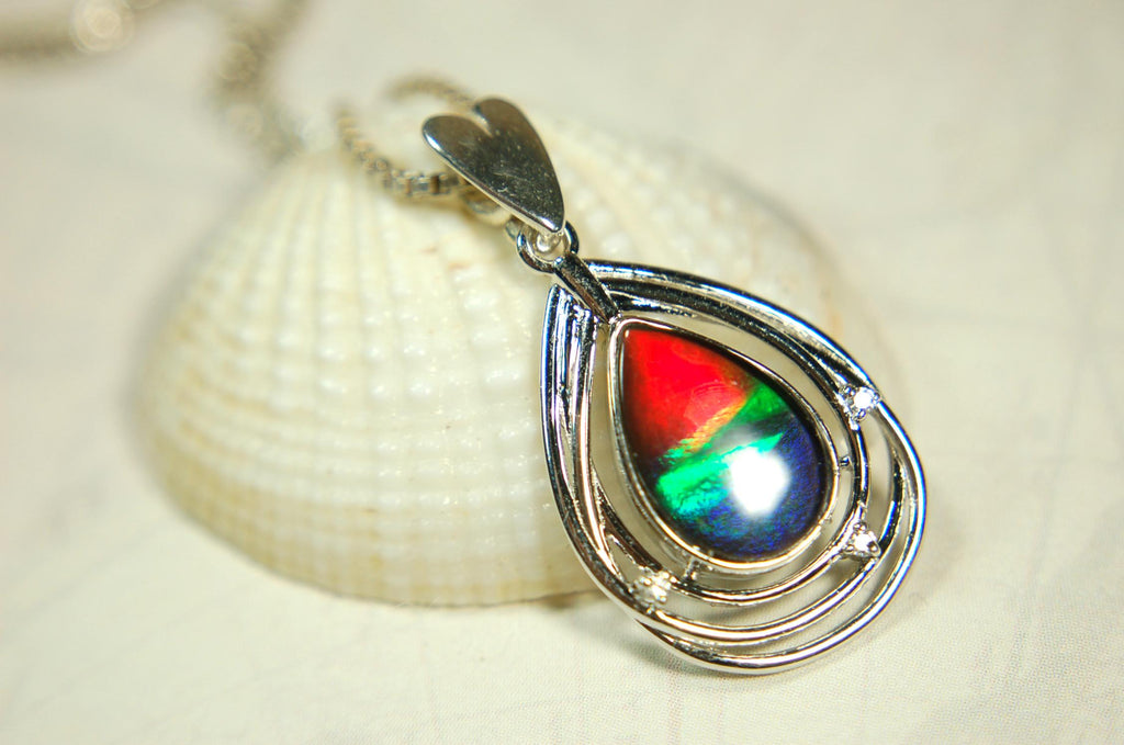 Eye-Catching Ammolite Pendant gift for Mothers Day she will treasure.Genuine Ammolite mined, finished and shipped from Canada 032015