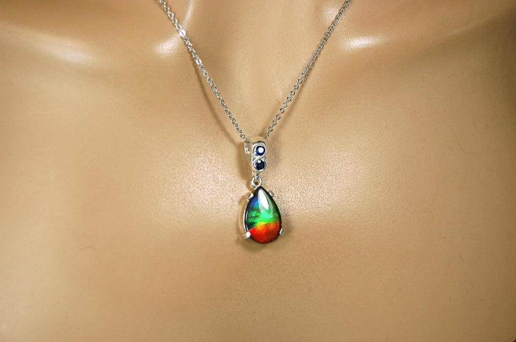 Ammolite Pendant Necklace.Sapphire studded bail.Brilliant rainbow colors.Sterling silver set.RARE gift for her.071115