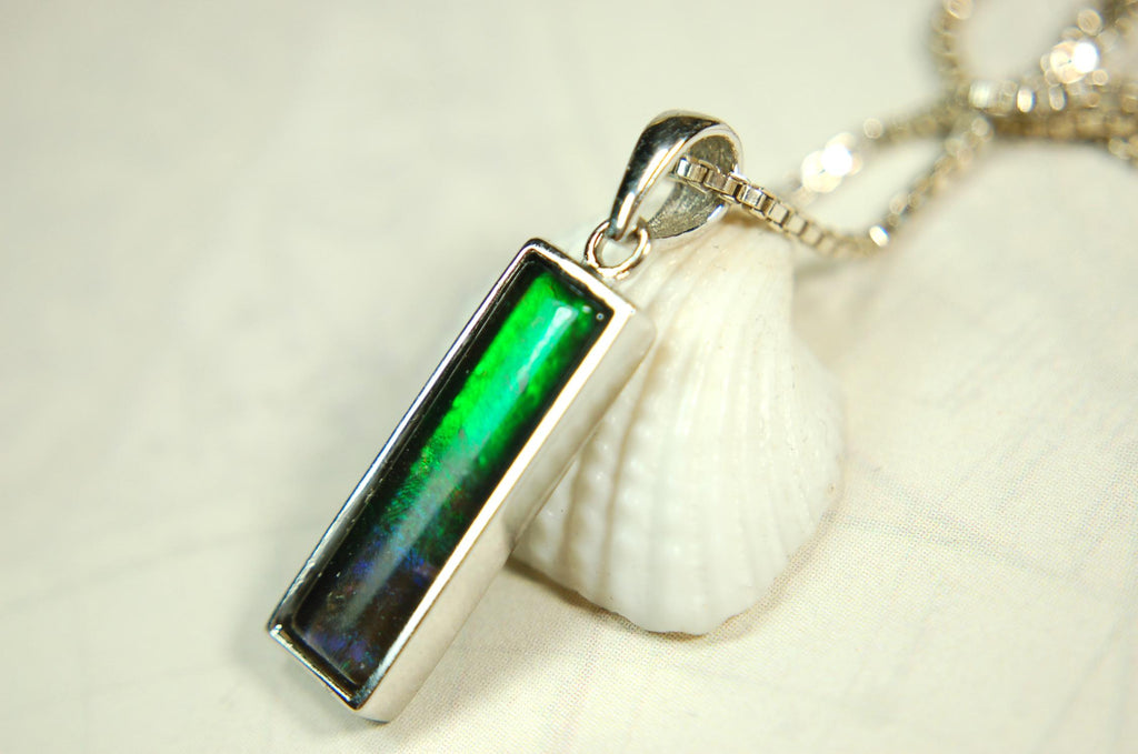 Lovely Ammolite pendant - the perfect gift for someone special.Sterling Silver plated with Rhodium so allergy free.052415