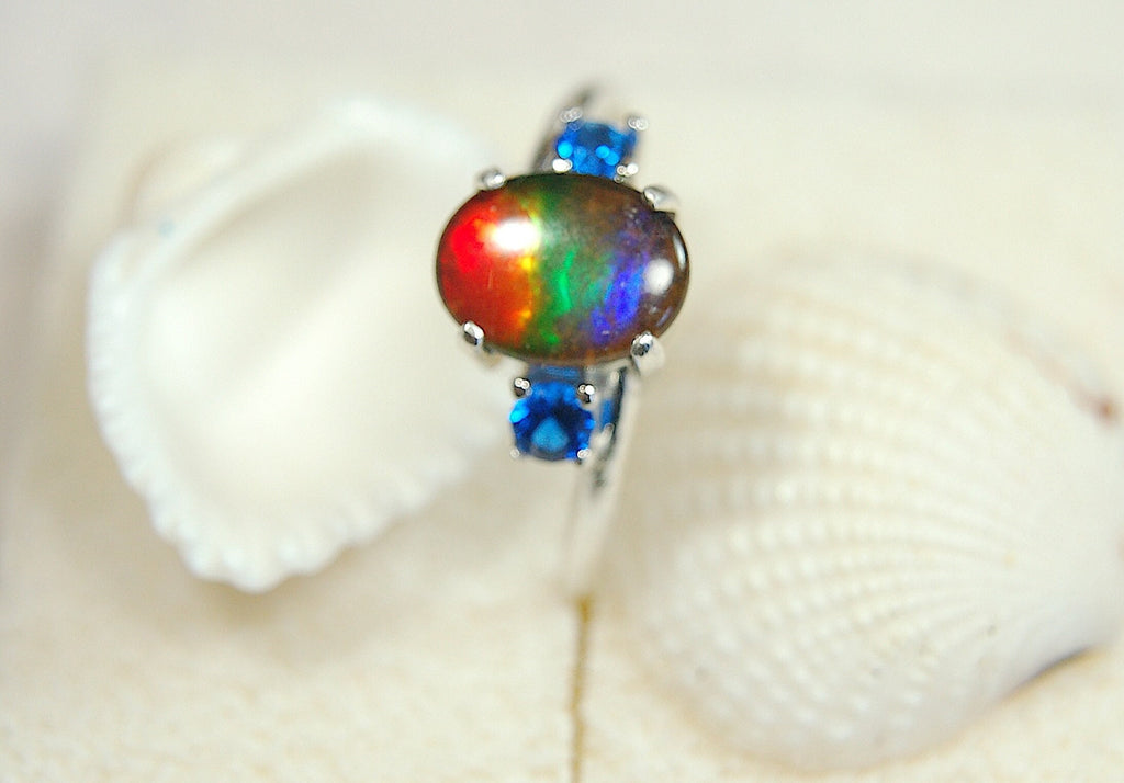 Ammolite Ring with brilliant Spinel side stones.Size 7.