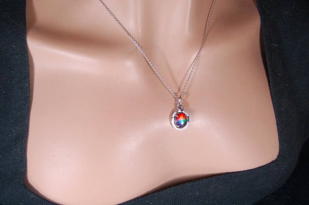 Ammolite Jewelry Pendant with RARE Pink.Stunning color changer.See 160 other quality offerings in silver and gold.Perfect gift.#080518