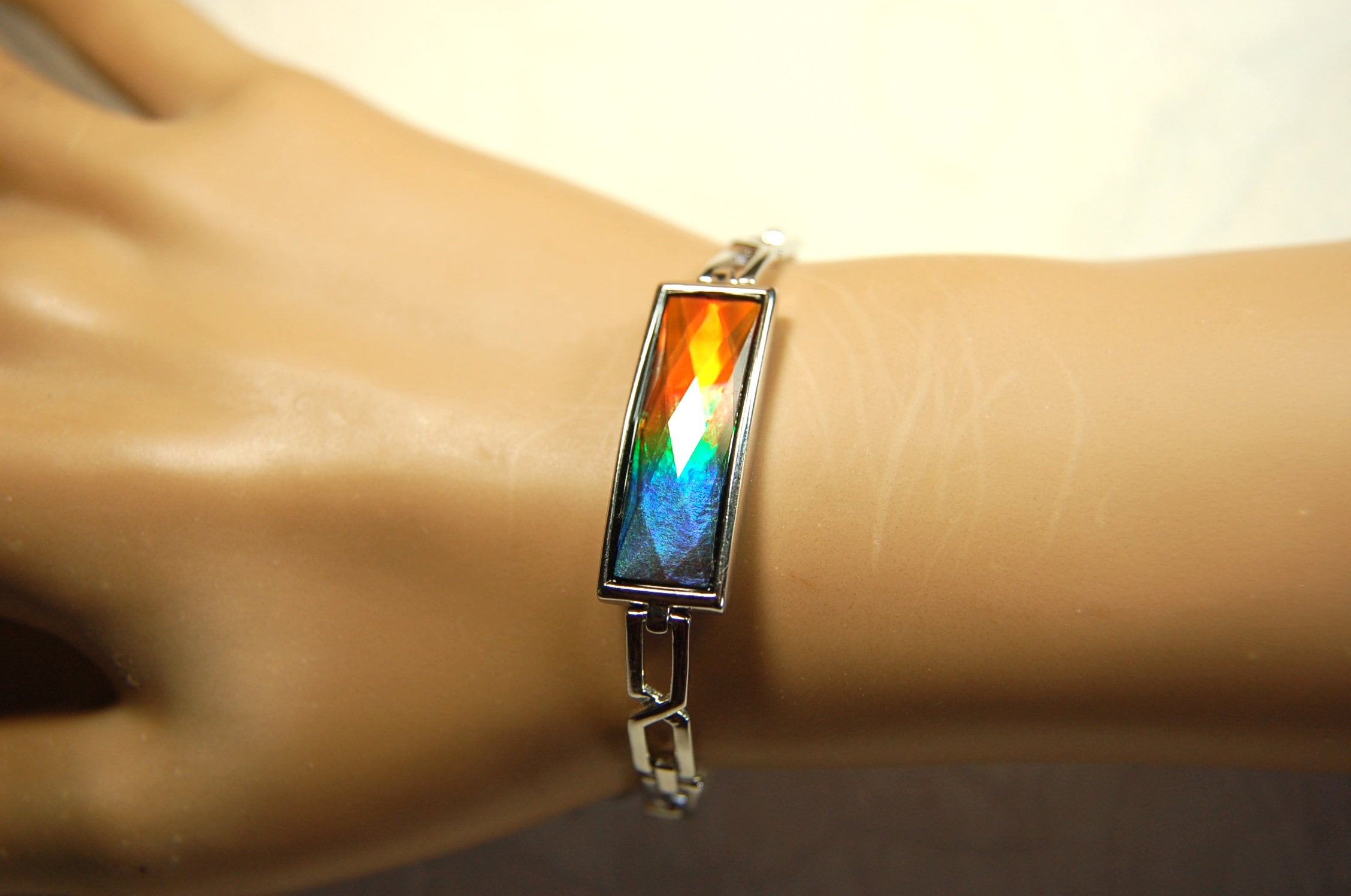 Ammolite Jewelry bracelet.Bright faceted gem shipped free.No import tax to US under CUSMA exemption #070614