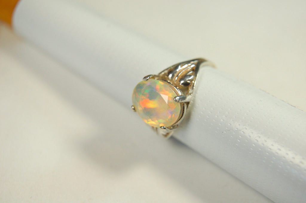 Opal ring.Bright Faceted Natural gem.Lovely flashing colors.#102612