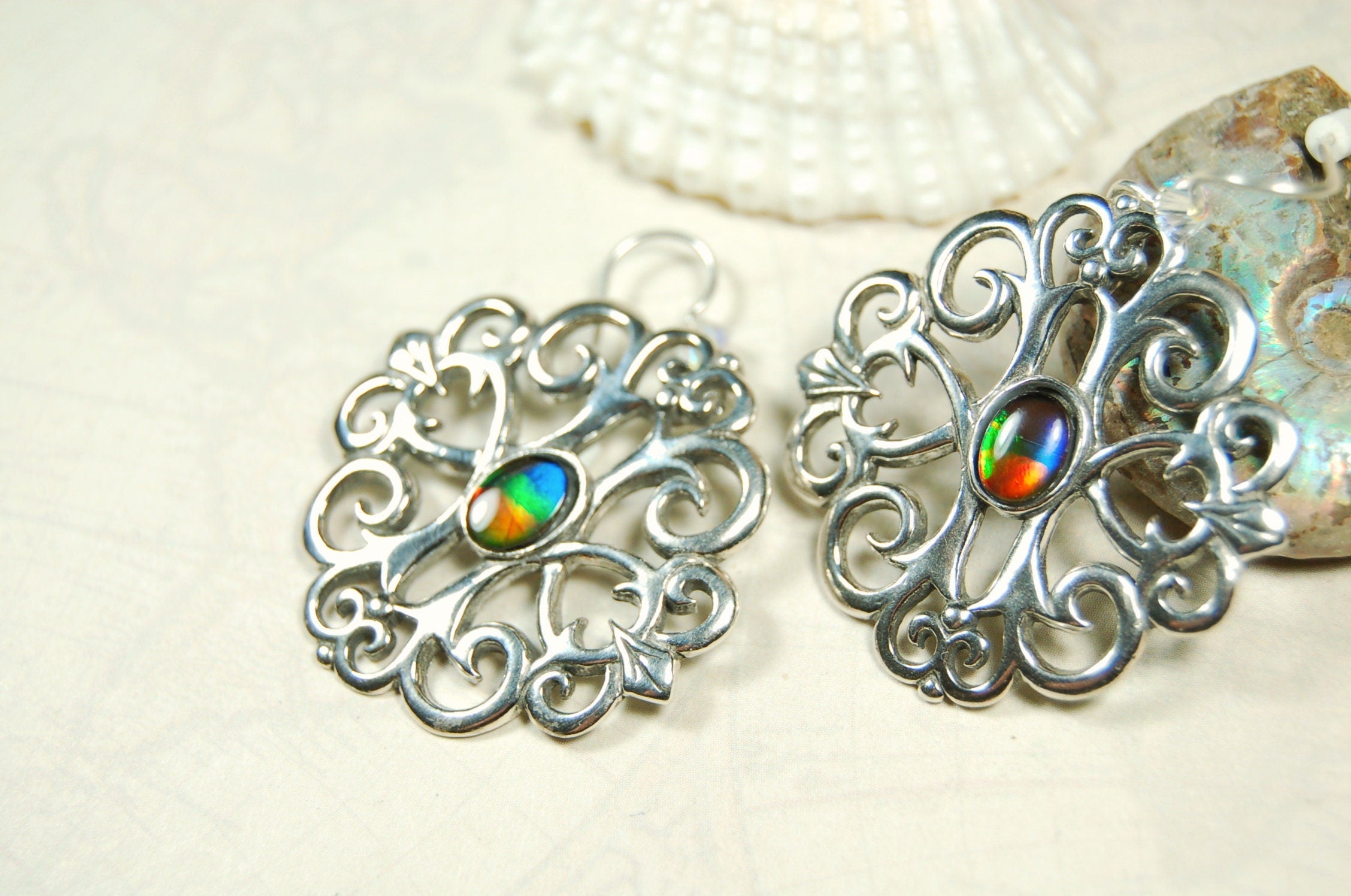 Ammolite Earrings.Large showy sterling silver  settings.#111919