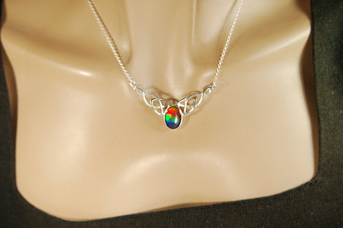 Ammolite Jewelry Necklace of the much admired Rainbow type.Four colors. Lovely Celtic setting with extender.#042513