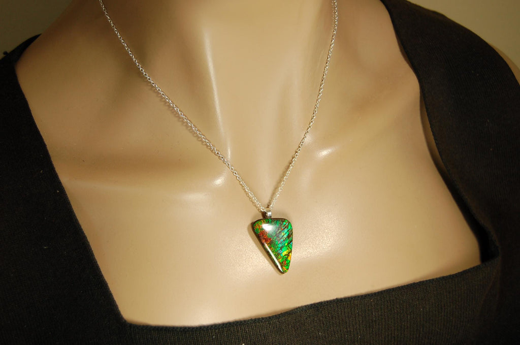 Natural Ammolite Gemstone Pendant from Alberta Canada with bright rich varied colors. A perfect Unisex  birthday gift. 032416