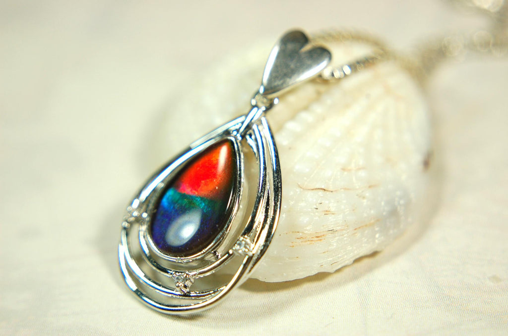 Eye-Catching Ammolite Pendant gift for Mothers Day she will treasure.Genuine Ammolite mined, finished and shipped from Canada 032015