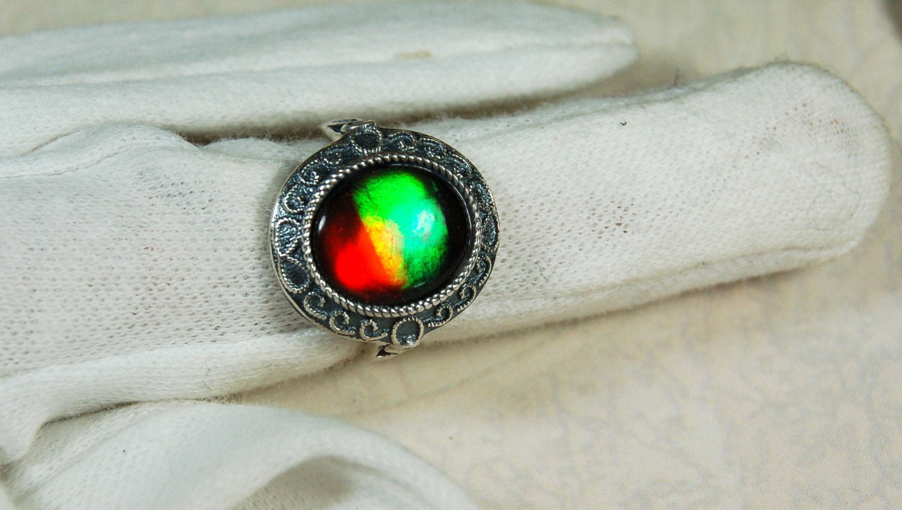 Ammolite Ring.Adjustable fit.Brilliant flashing colors.022219.