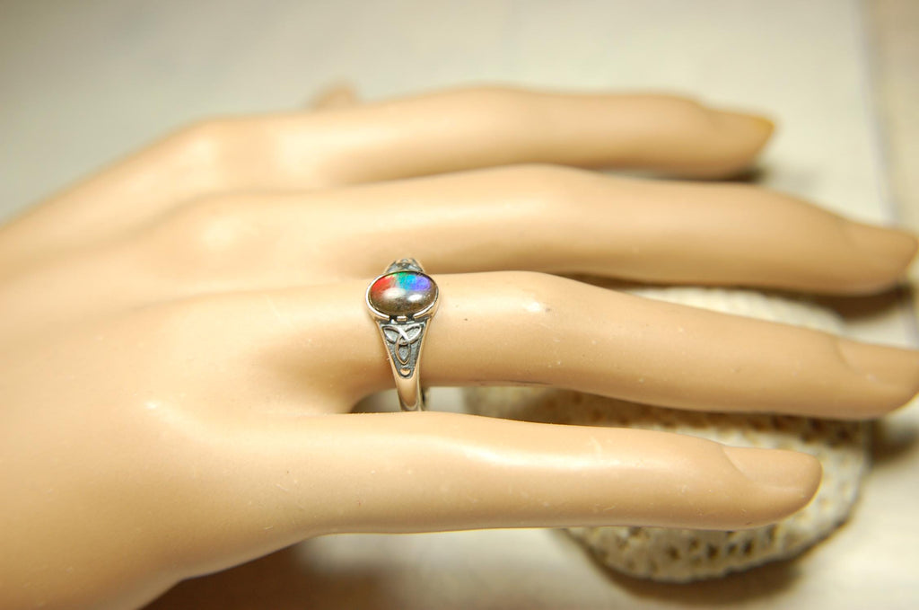 Ammolite Ladies Ring.Sterling Silver.Very feminine, has Celtic design and is in your size too!Brilliant tricolor gem.Gift for her?030816